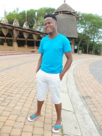 Mbuyi njoying the fresh air of the ocean during a field excursion